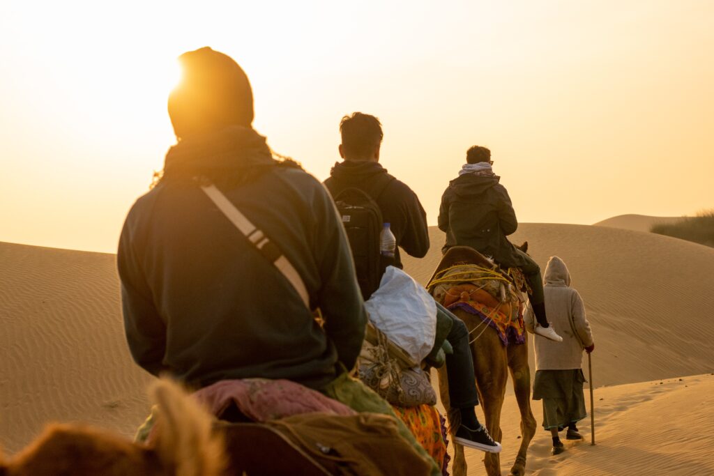 Camel safari on the golden sand dunes of Jaisalmer, featured in our Rajasthan desert tours.