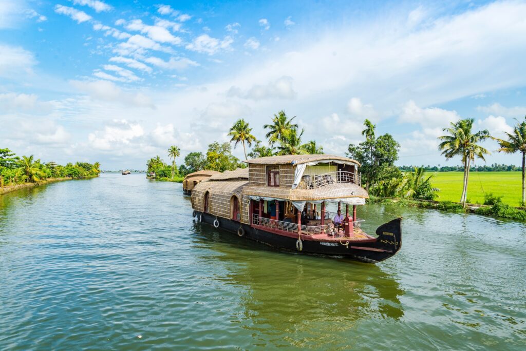 A traditional Kerala houseboat cruise through the palm-fringed backwaters near Marari on a 9-day tour.