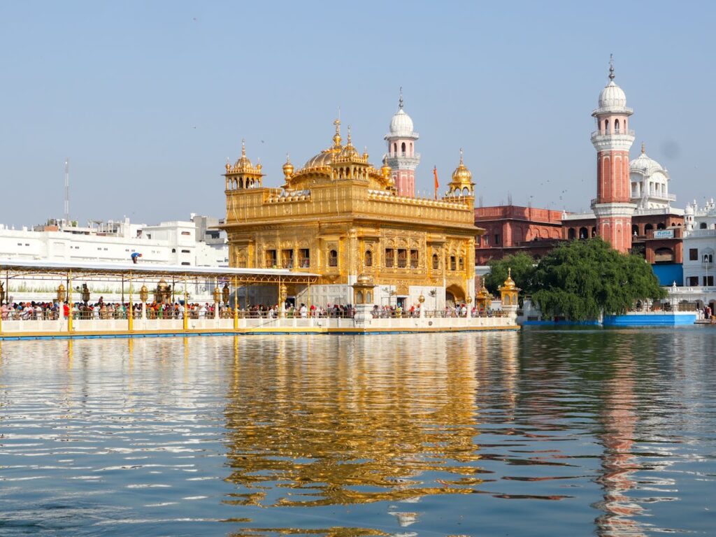 Expert tour guide explaining Golden Temple history on Shamrock Journeys Amritsar trip