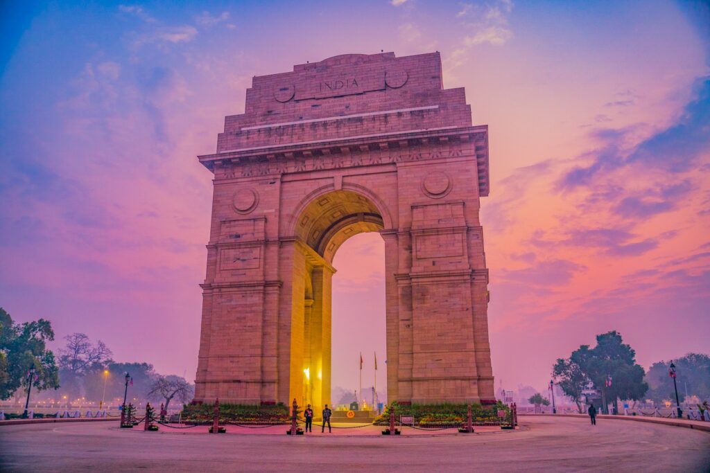 Best time to visit Delhi - pleasant winter weather at India Gate with clear skies