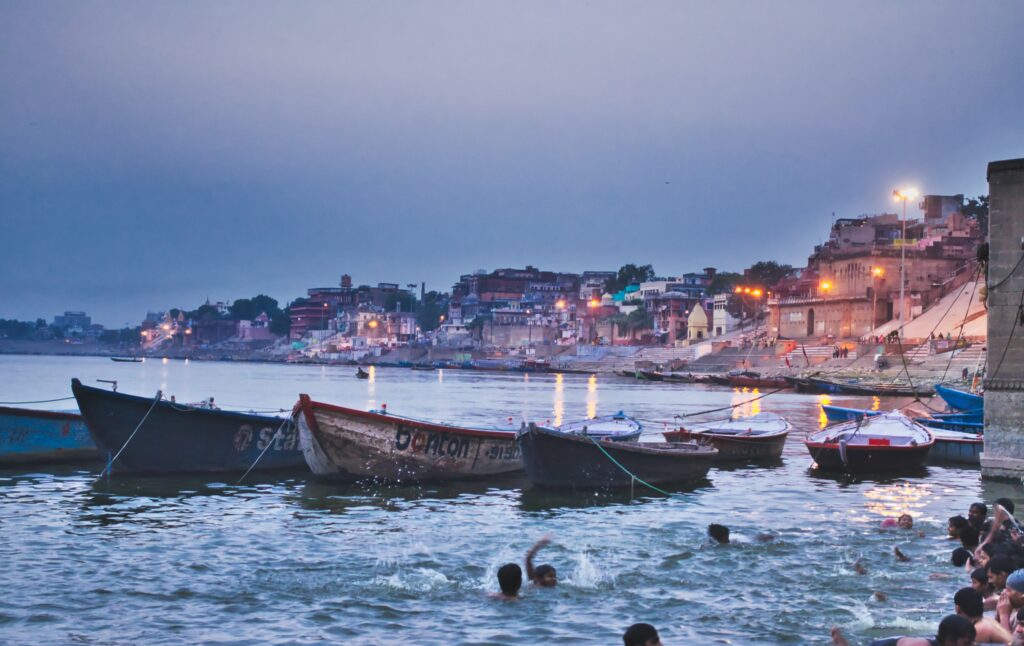 Tour group during spiritual tours in India visiting Varanasi ghats