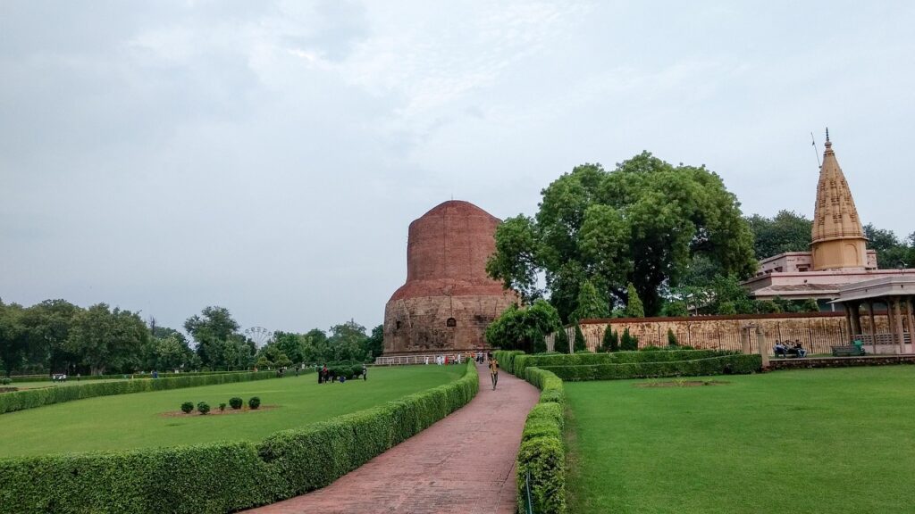Tourist Exploring Sarnath's Dhamek Stupa