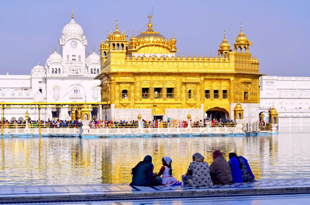 Golden Temple Amritsar (Sri Harmandir Sahib) at sunrise, first stop on 9-day spiritual tour.