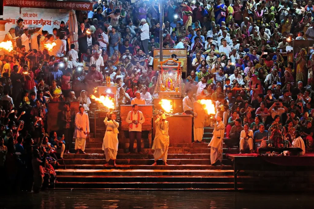 Pilgrims participating in the holy Ganga Aarti ceremony at Har Ki Pauri in the holy city of Haridwar