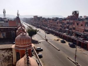Shopping for spices and textiles in a vibrant local market in Jaipur on the Golden Triangle tour.