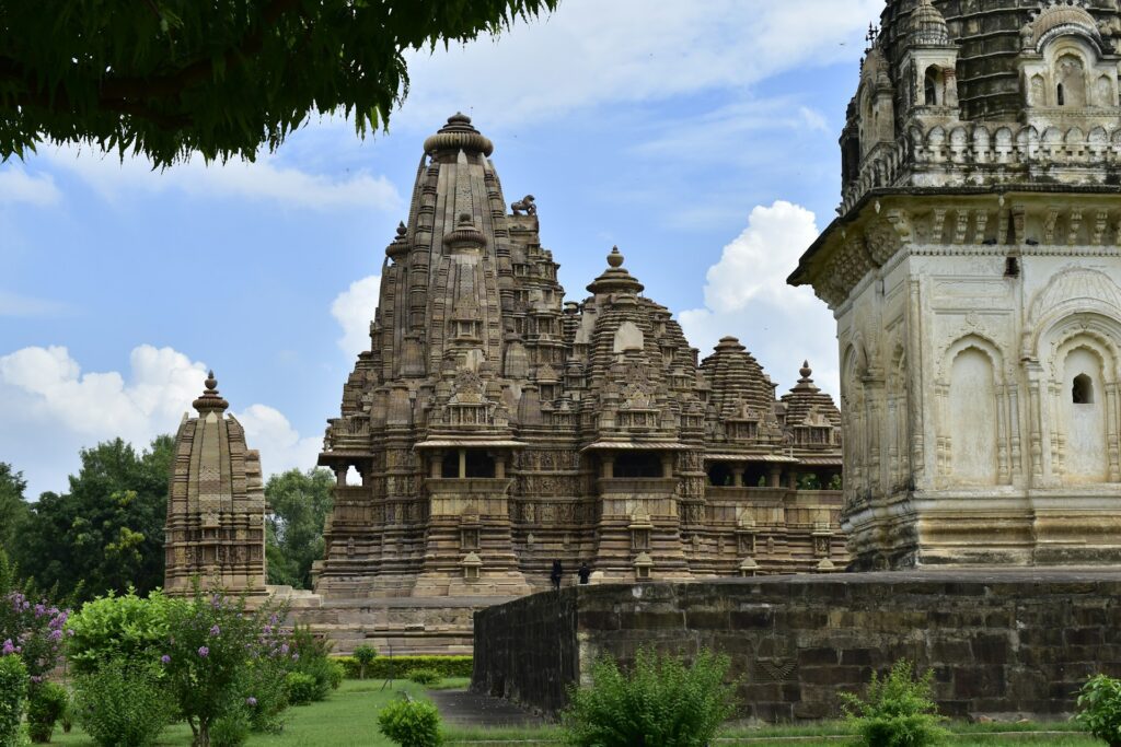 Aerial view of the Khajuraho Group of Monuments, a UNESCO World Heritage Site in Madhya Pradesh, showcasing intricate Nagara-style temple architecture.