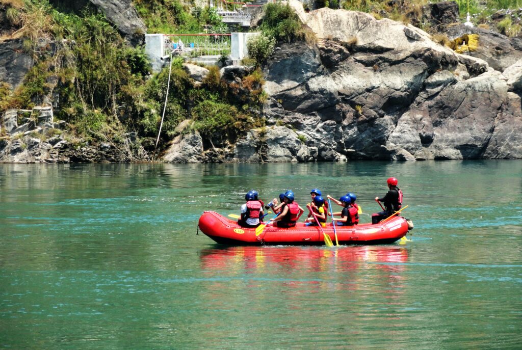 Group river rafting on the Ganges near Rishikesh on a Mussoorie-Haridwar-Rishikesh tour package