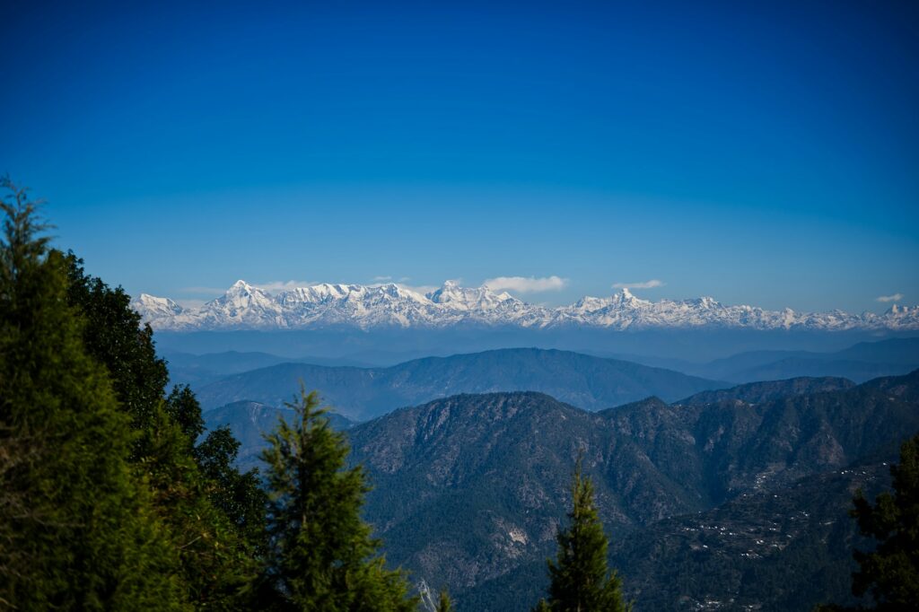 Breathtaking view of the Himalayas from Snow View Point in Nainital, accessible by cable car on north India tours.