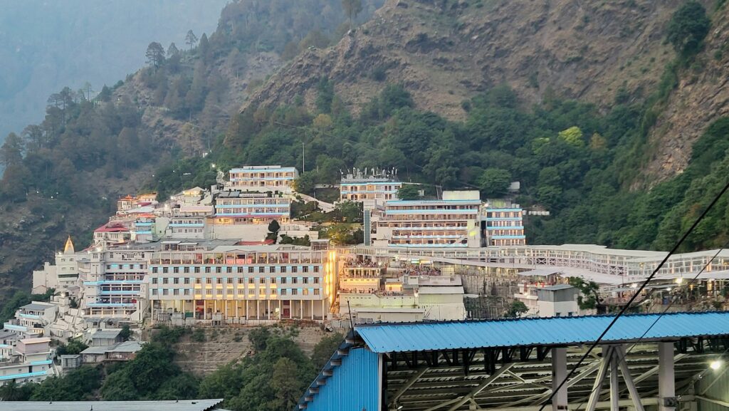 Devotees on the Vaishno Devi yatra trek from Katra during a holy pilgrimage tour package.