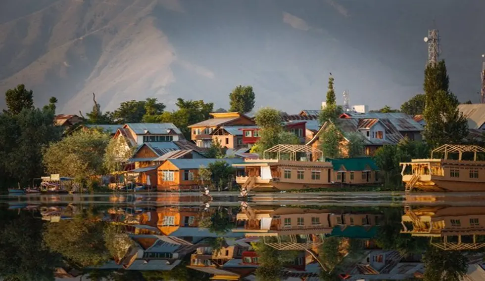 Colorful houseboats lined on the calm waters of Dal Lake, Srinagar