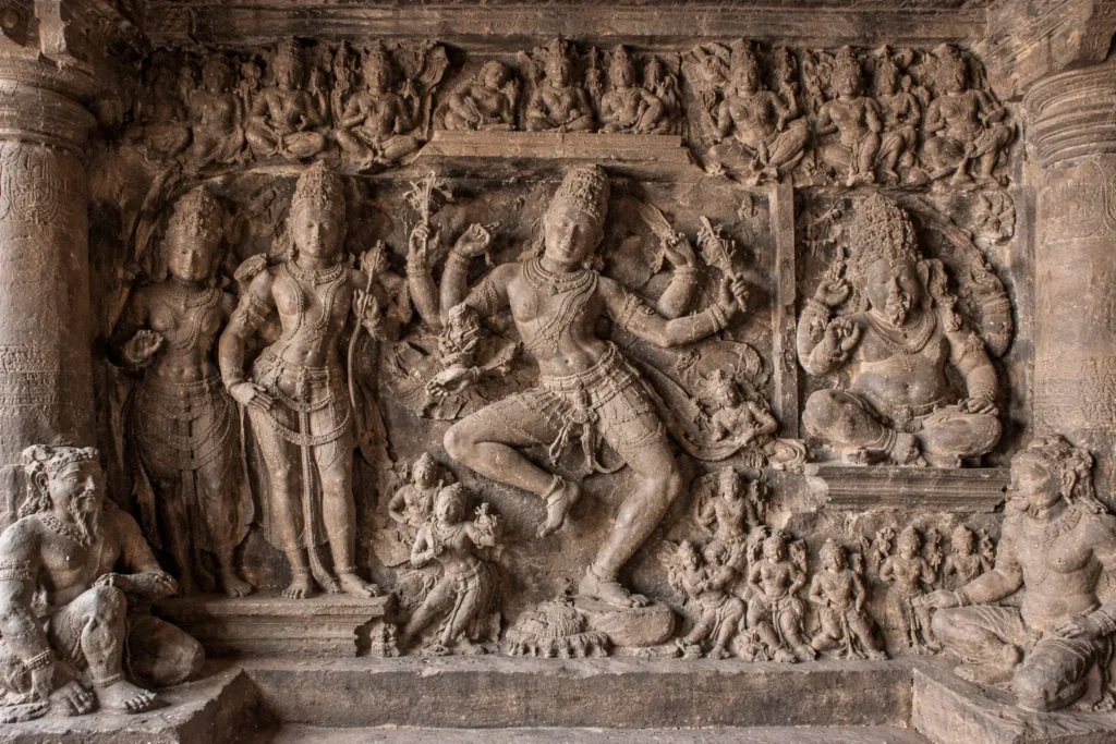 Intricate rock-cut sculptures depicting Hindu deities at Ellora Caves, India