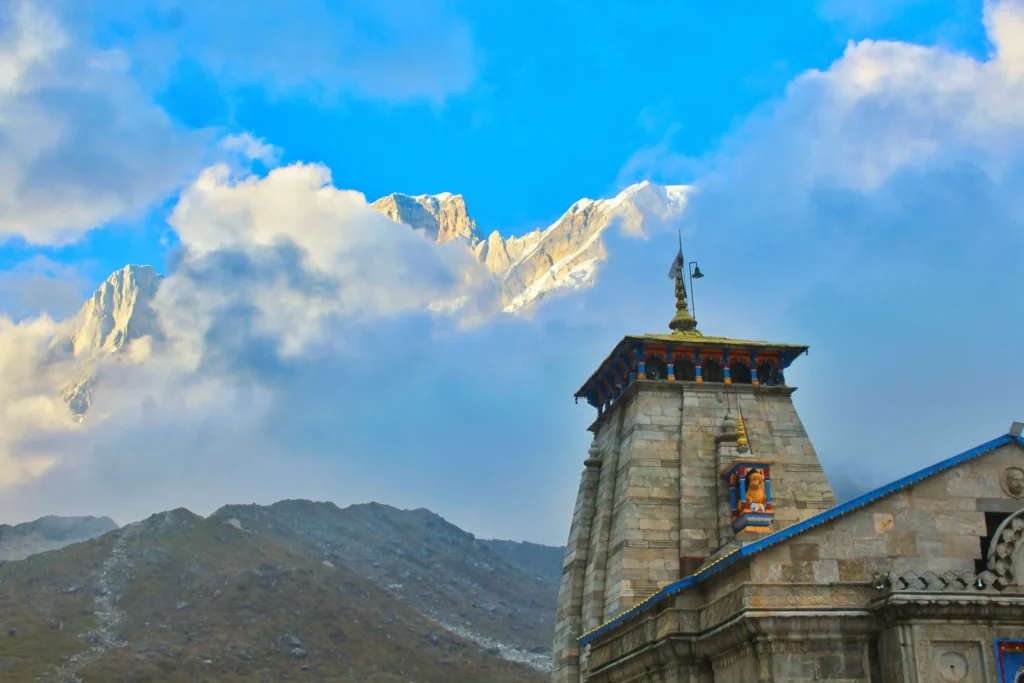 Close-up view of the ancient Kedarnath Temple during a Do Dham Yatra pilgrimage.