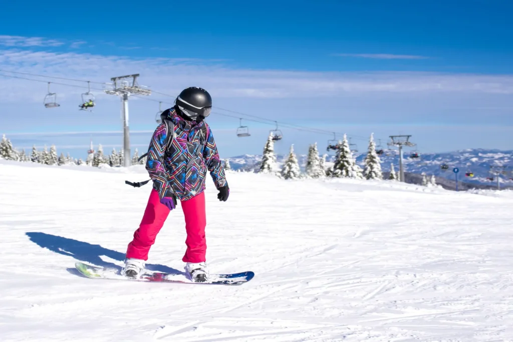 Winter skiing in Gulmarg, Kashmir with skier on snowy slope