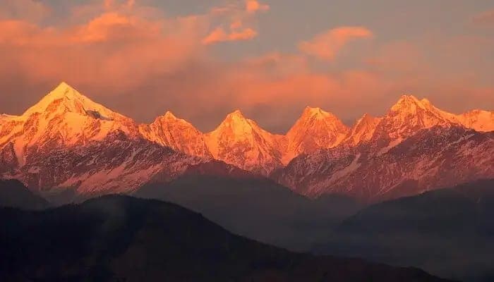 Sunrise over the Himalayan range from Kausani viewpoint, including Nanda Devi and Trishul peaks