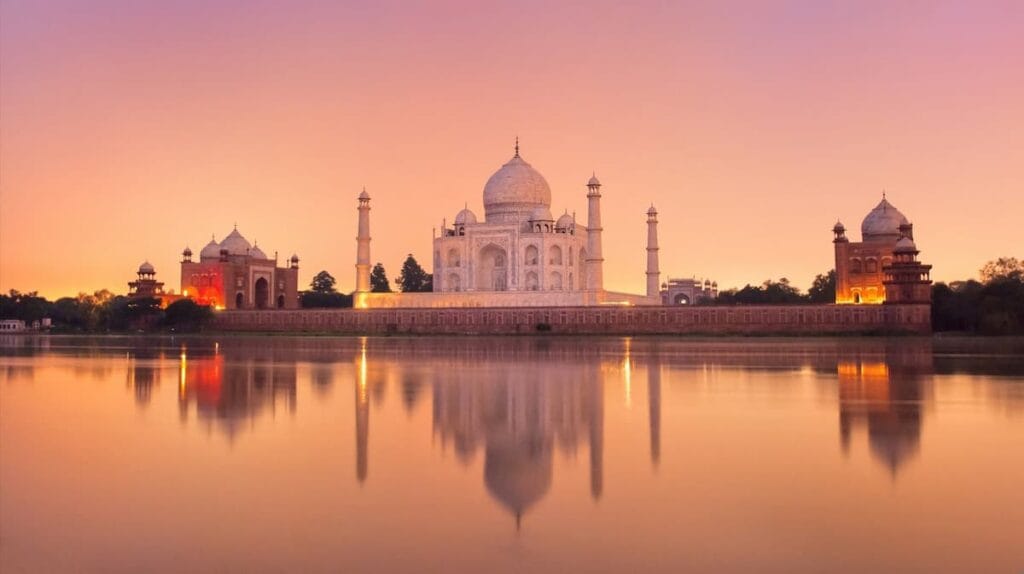 Mehtab Bagh gardens offering a sunset view of the Taj Mahal across the Yamuna River