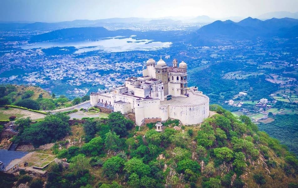 Monsoon Palace (Sajjangarh Fort) offering panoramic sunset views over Udaipur