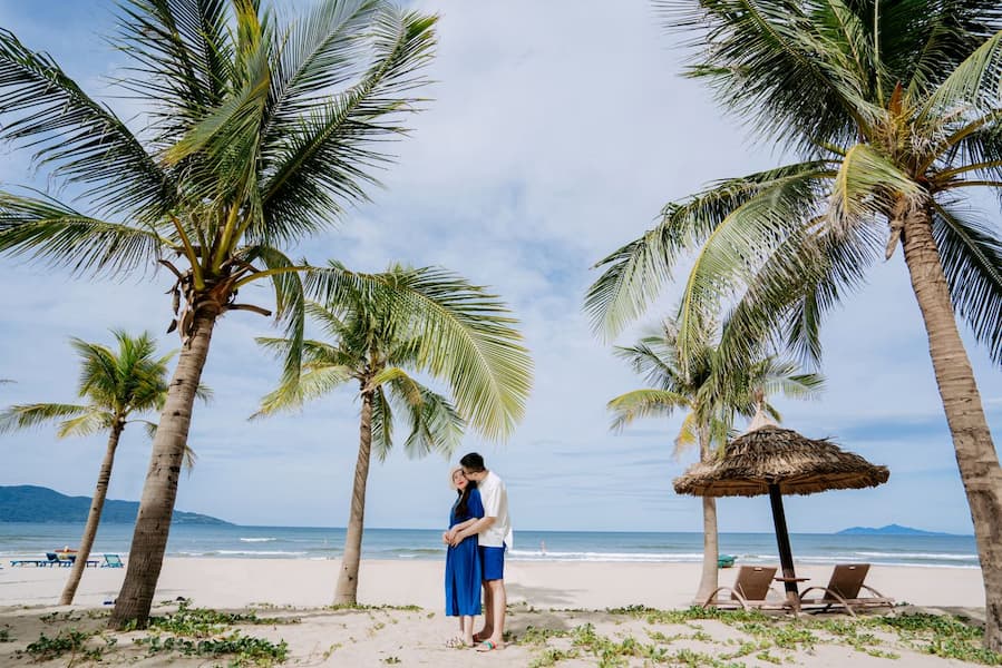 Palm-fringed crescent bay at Palolem Beach, a serene South Goa honeymoon destination