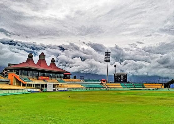 HPCA cricket stadium in Dharamshala with the Dhauladhar peaks behind