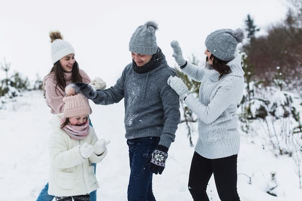 Family enjoying the mountain views on a Manali family tour