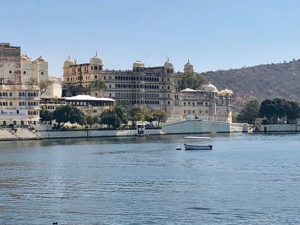 Boat ride on Lake Pichola with a view of City Palace Udaipur